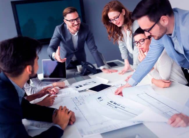 group-of-architects-working-on-project-PQWE4JL-scaled-1-pgq16196tzpsexx9jr0cxgoeh7r60sn7shu71o9afi